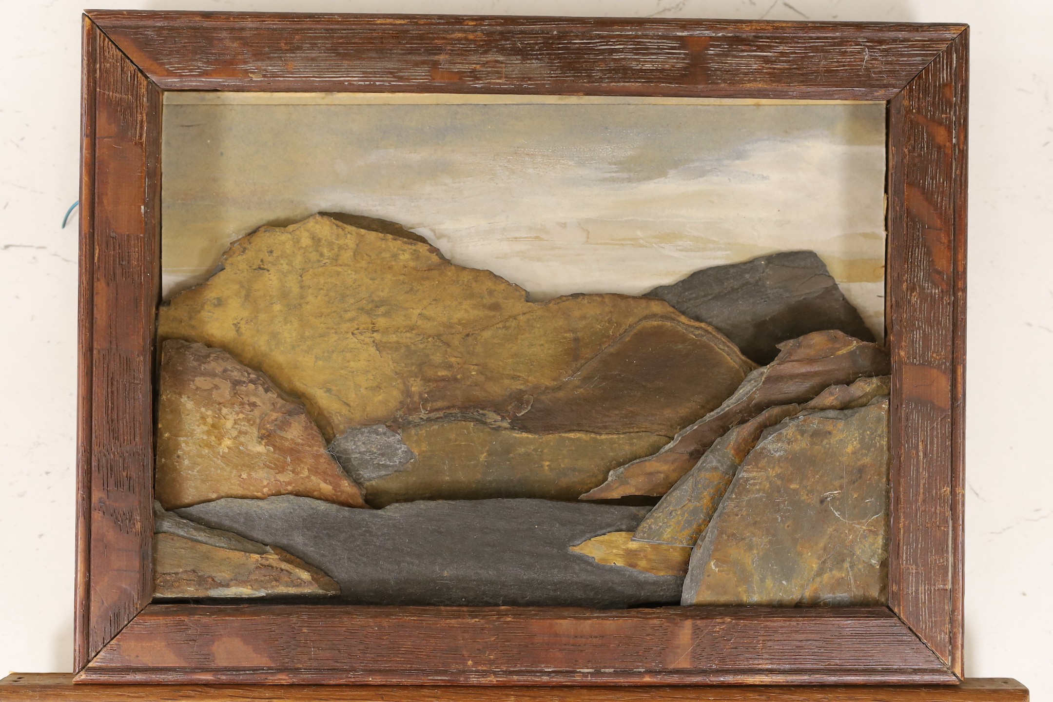 Ede Fitzpatrick. Irish Tweed picture, Connemara cottages, initialled and labelled verso, 22 x 30cm, with a Welsh slate picture, Y Carn and Llyn Ogwen, 16 x 23cm